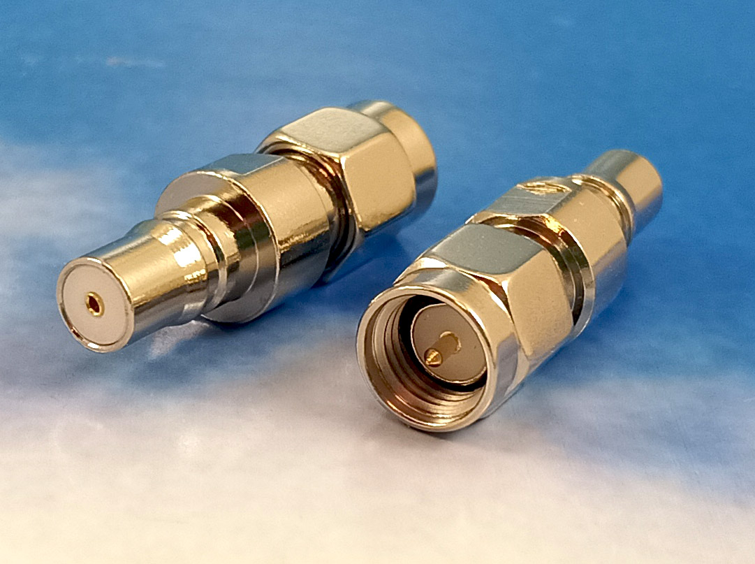 QMA female / SMA male adaptor